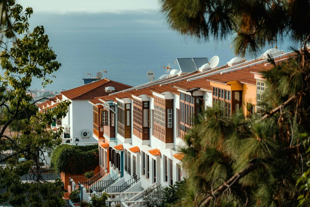 Charming townhouses on a slope with ocean views in La Orotava, Canary Islands, Spain.
